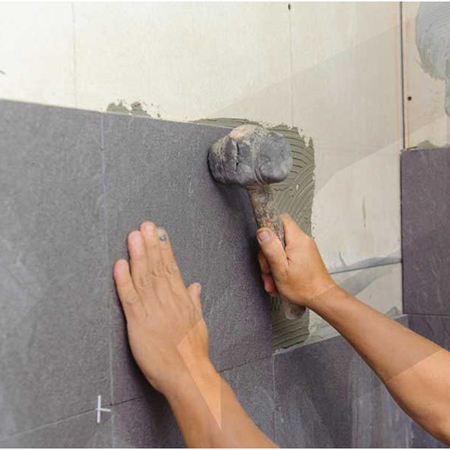 Ốp gạch vào tường